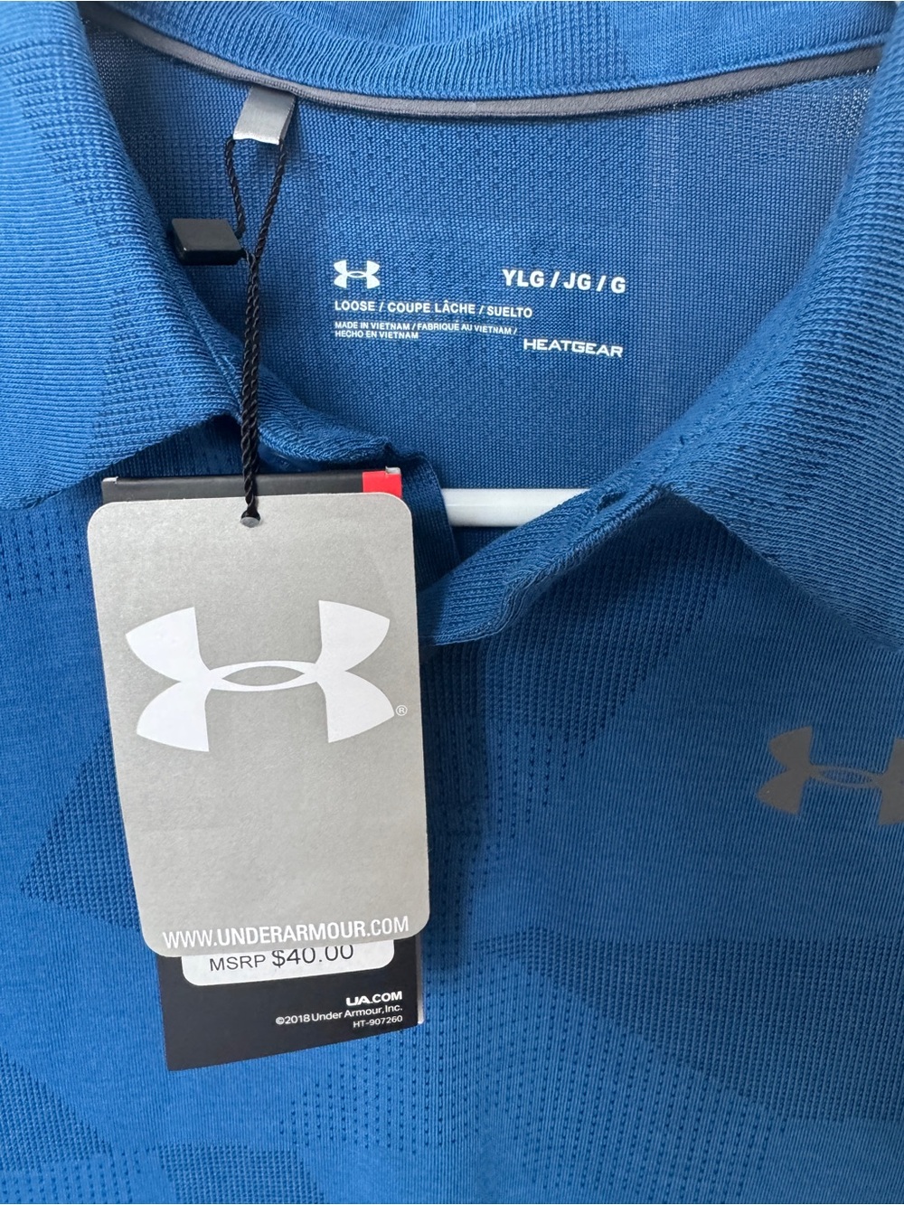 Under Armour Blue Polo. Boys size Large